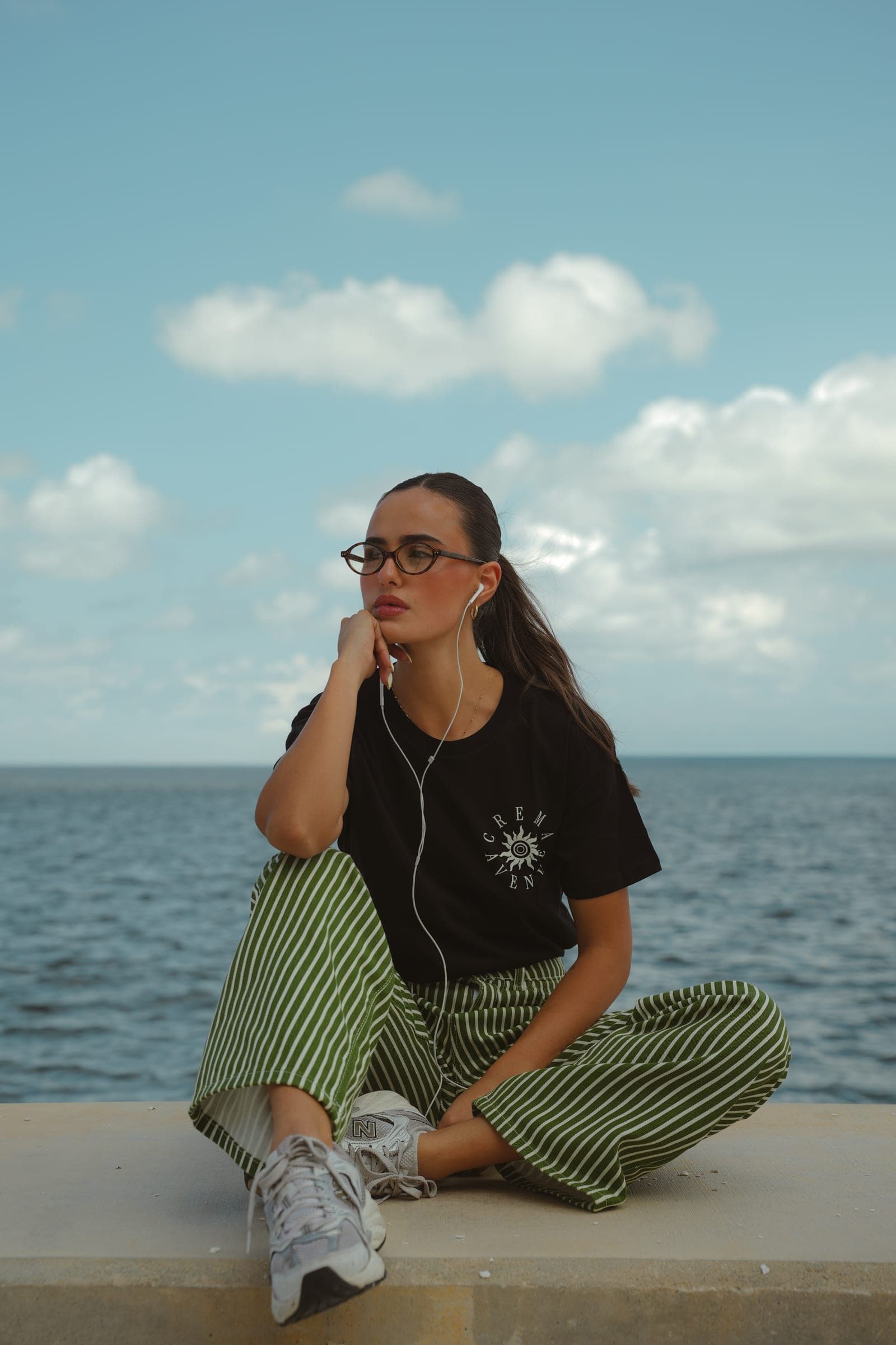 ‘All Roads’ Tee - Black — worn by the lake